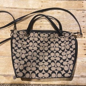 Tan coach brand purse gently used with a few marks as seen in the pictures